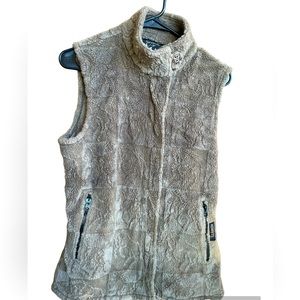 Kerrit’s On Course Equestrian women’s quilted, brown horse print vest.